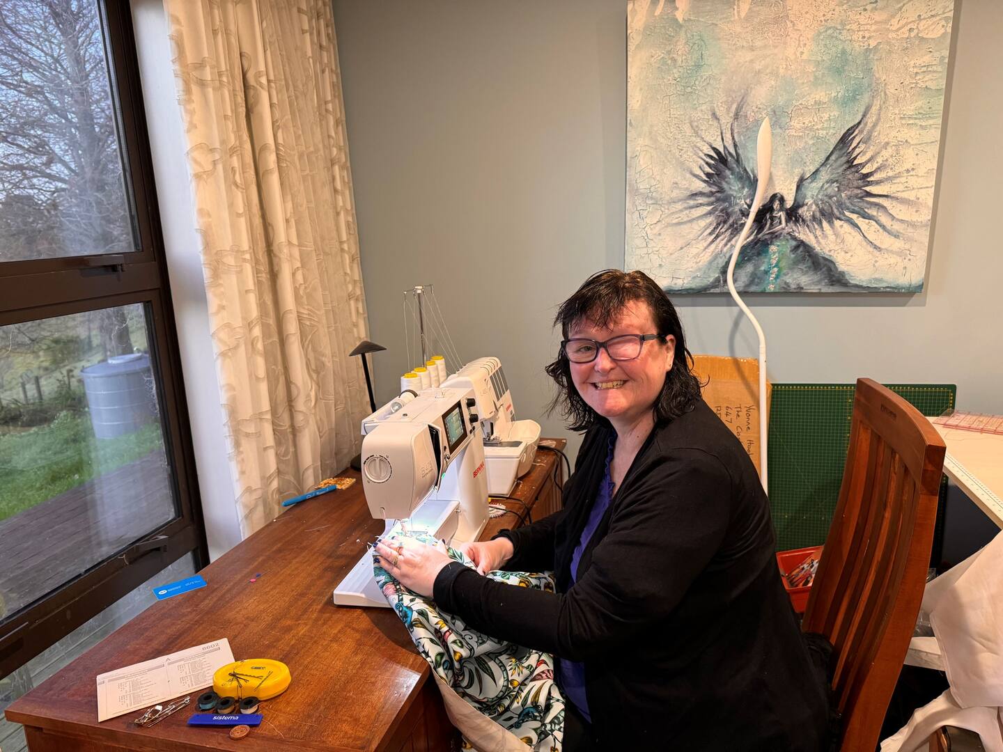 The Costume Queen at her sewing machine